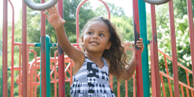 Child playing on a playground.